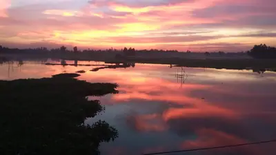 Sunset over wetland in Ghatail